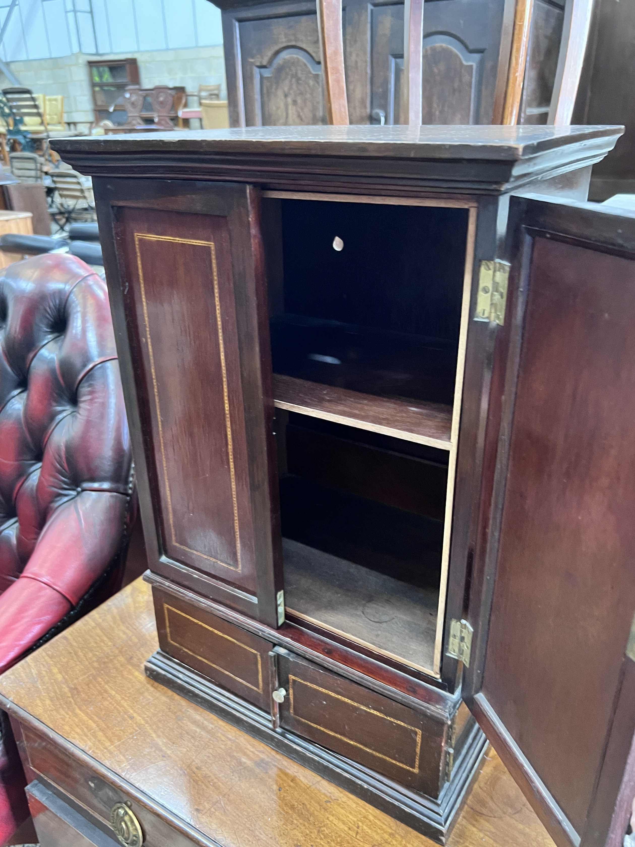 An Edwardian inlaid mahogany table top cabinet, width 39cm, depth 27cm, height 59cm